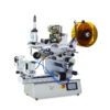 Semi-automatic roll labeling machine